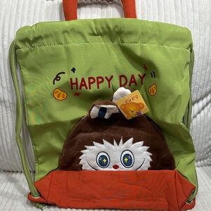 Green and Orange Backpack w/ handle& a Cute Labubu Design.New. Not used.